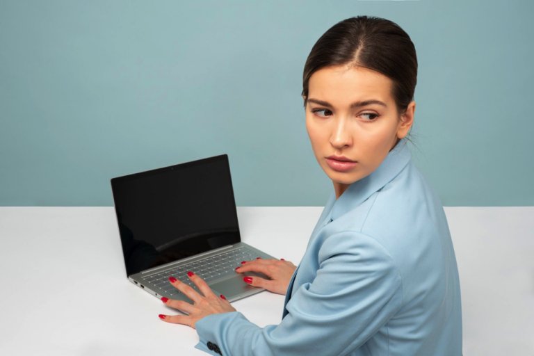 Woman on a laptop worried about malware